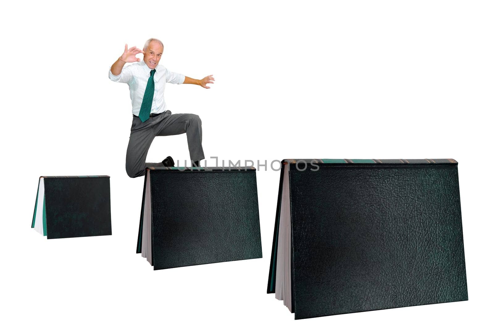 Businessman jumping over books isolated in white