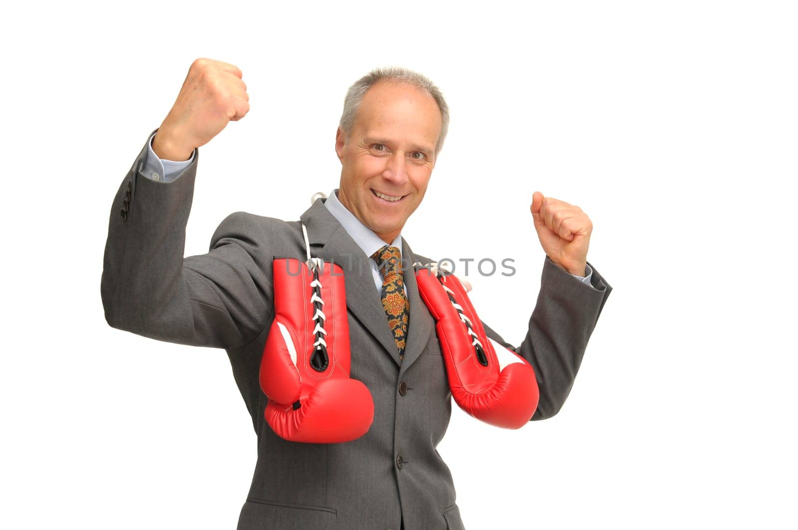 Businessman with boxing gloves isolated against a white background