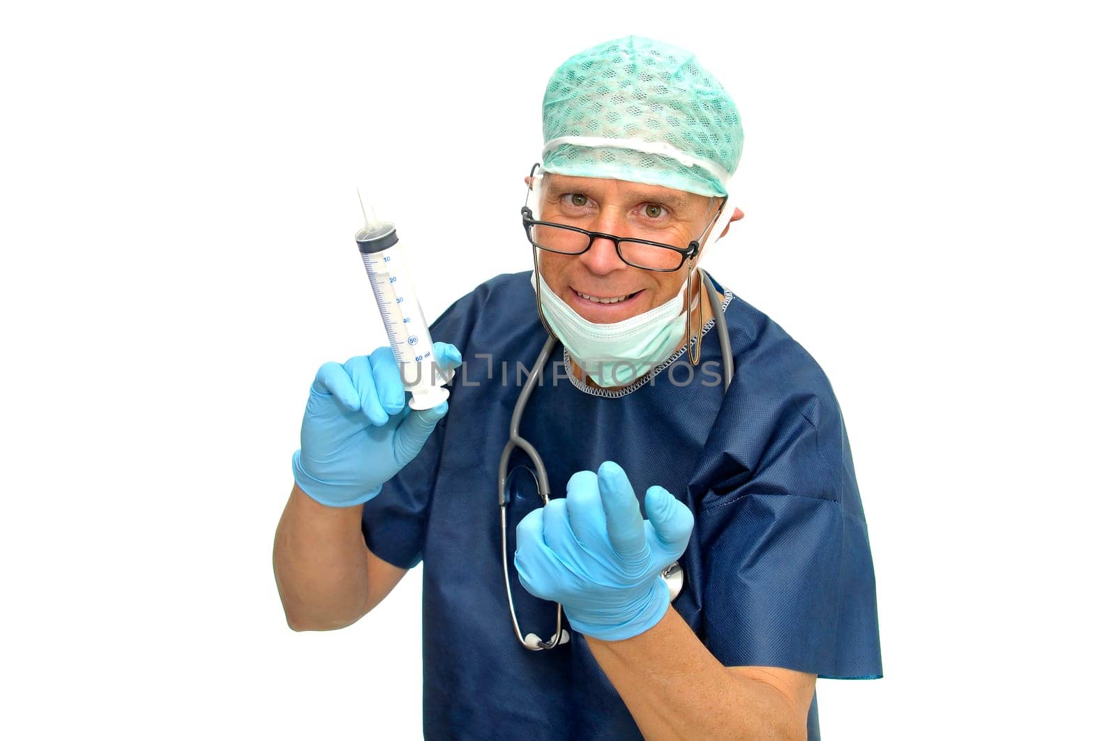 Doctor in uniform with huge syringe isolated in white