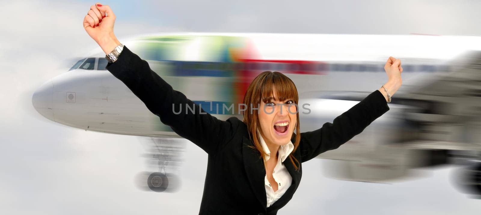 happy woman with a plane in the background
