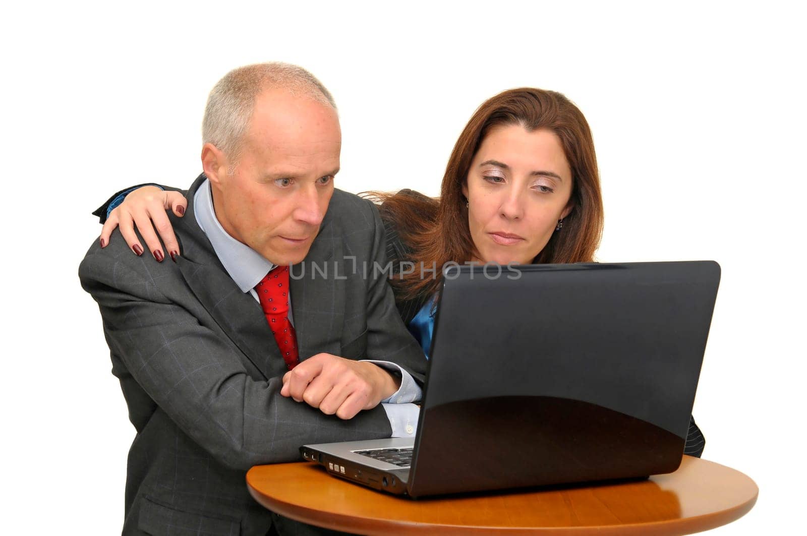 Businessman and woman with laptop isolated against a white background