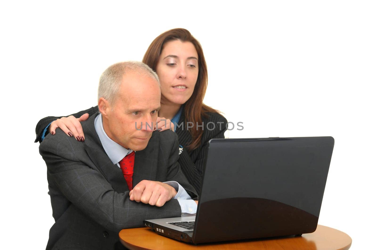 Businessman and woman with laptop isolated against a white background