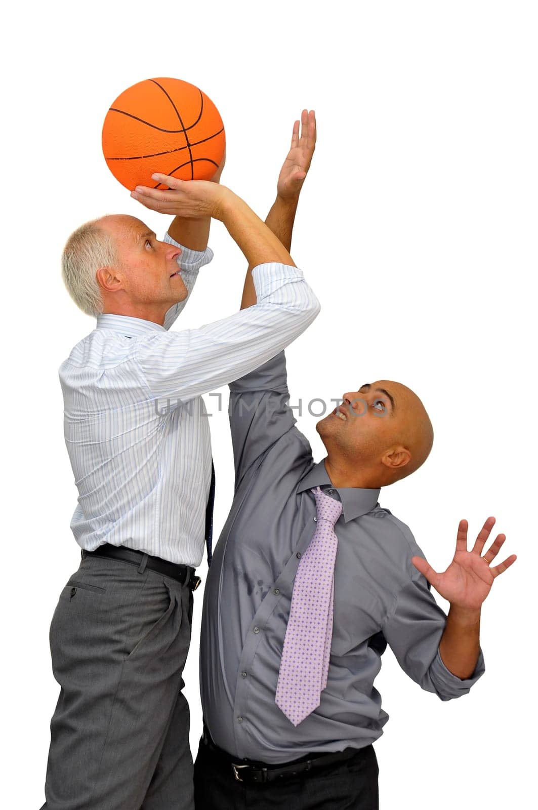 Two businessmen playing basketball isolated in white