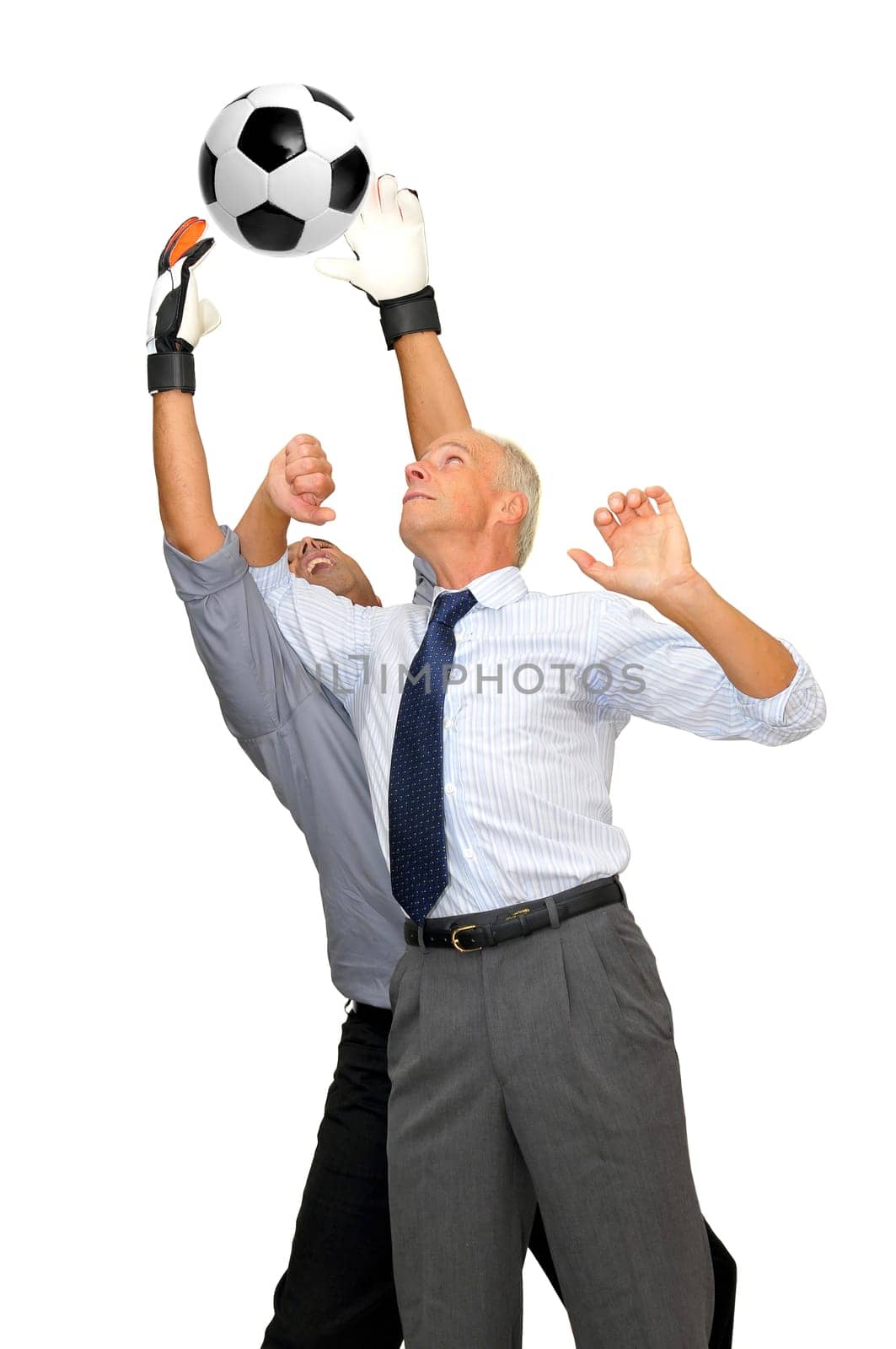 Two businessmen playing soccer isolated in white