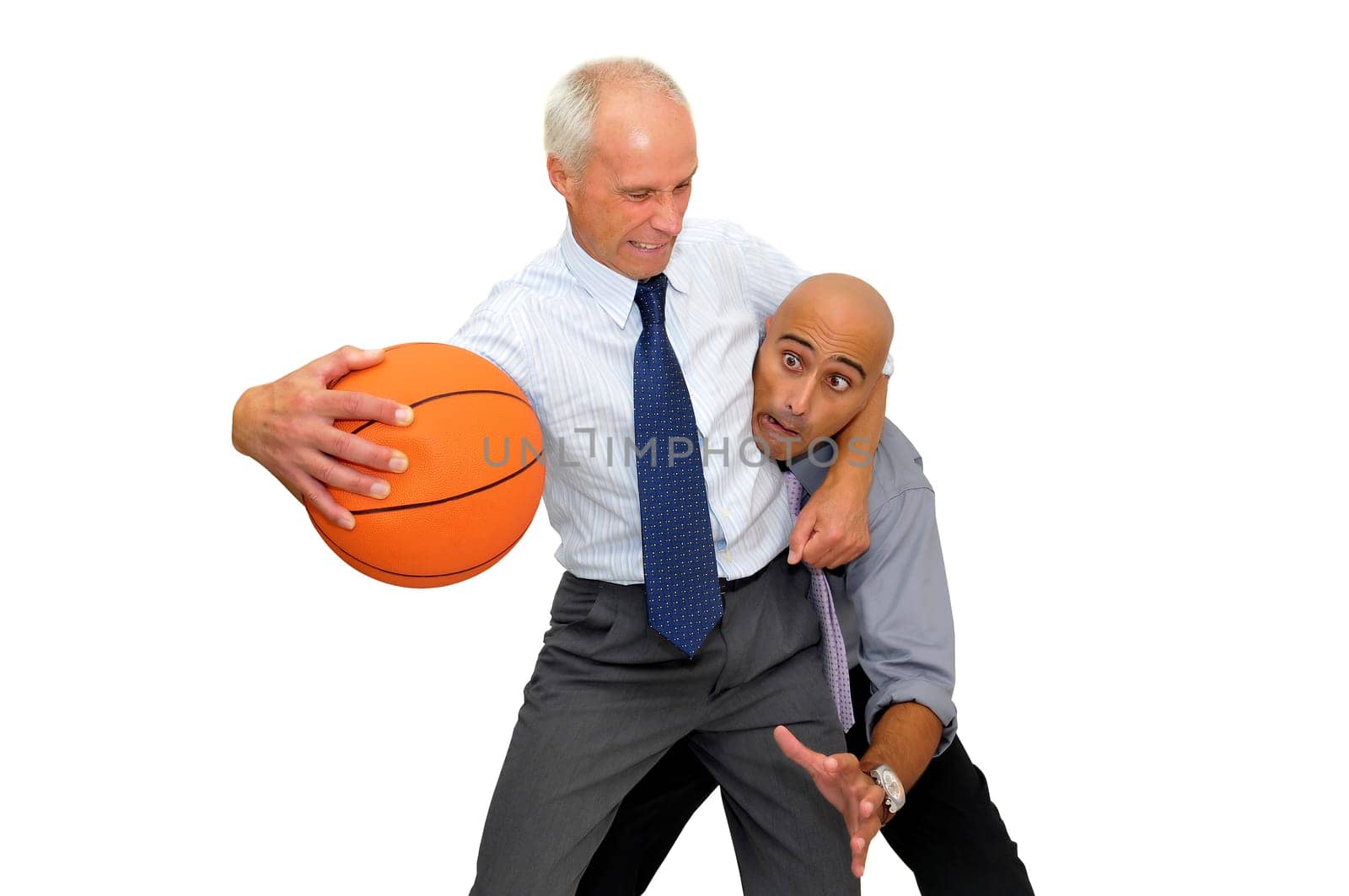 Two businessmen playing basketball isolated in white