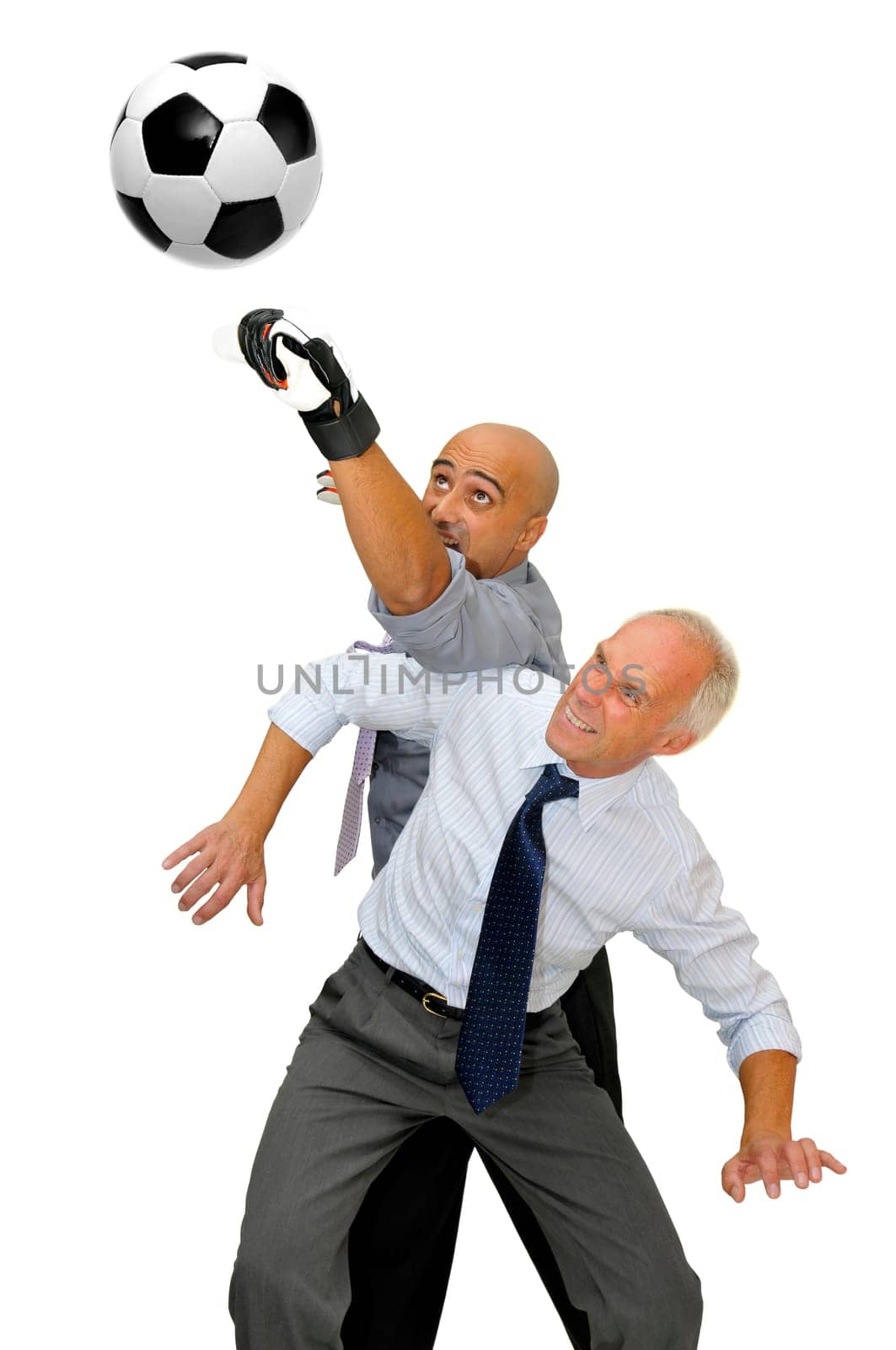 Two businessmen playing soccer isolated in white