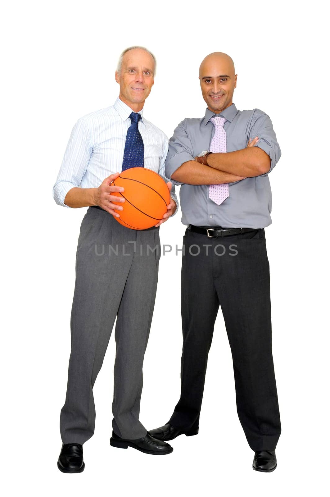 Two businessmen with a basketball isolated in white