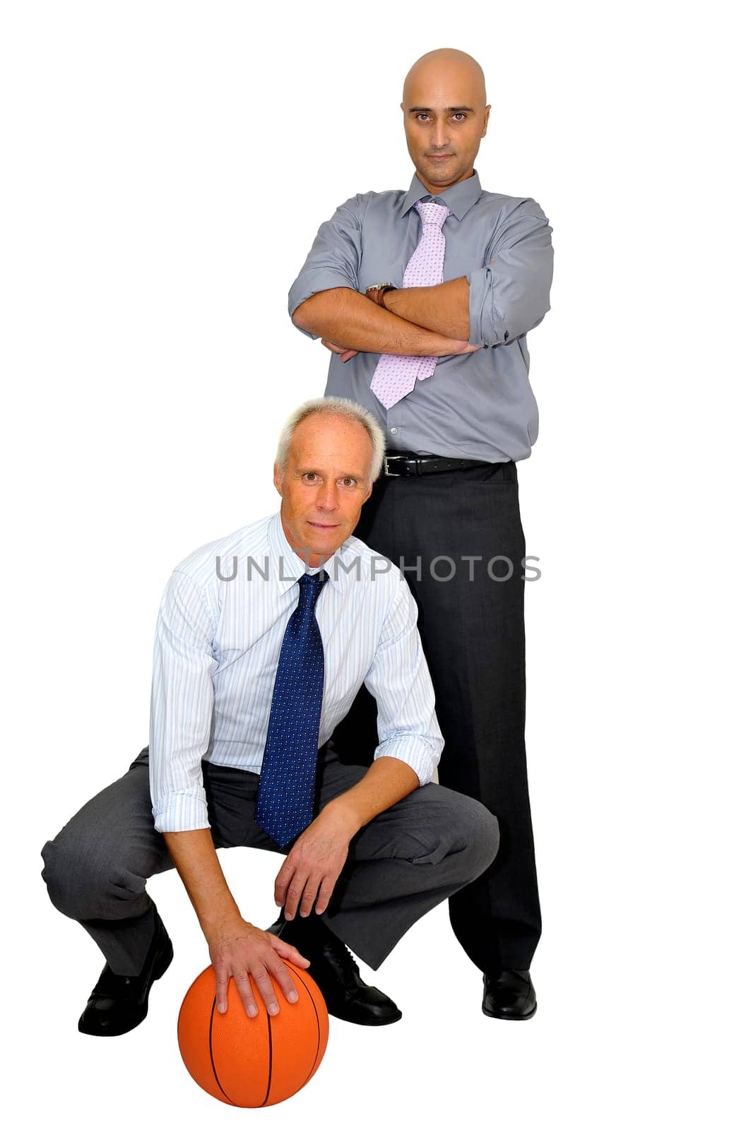 Two businessmen with a basketball isolated in white