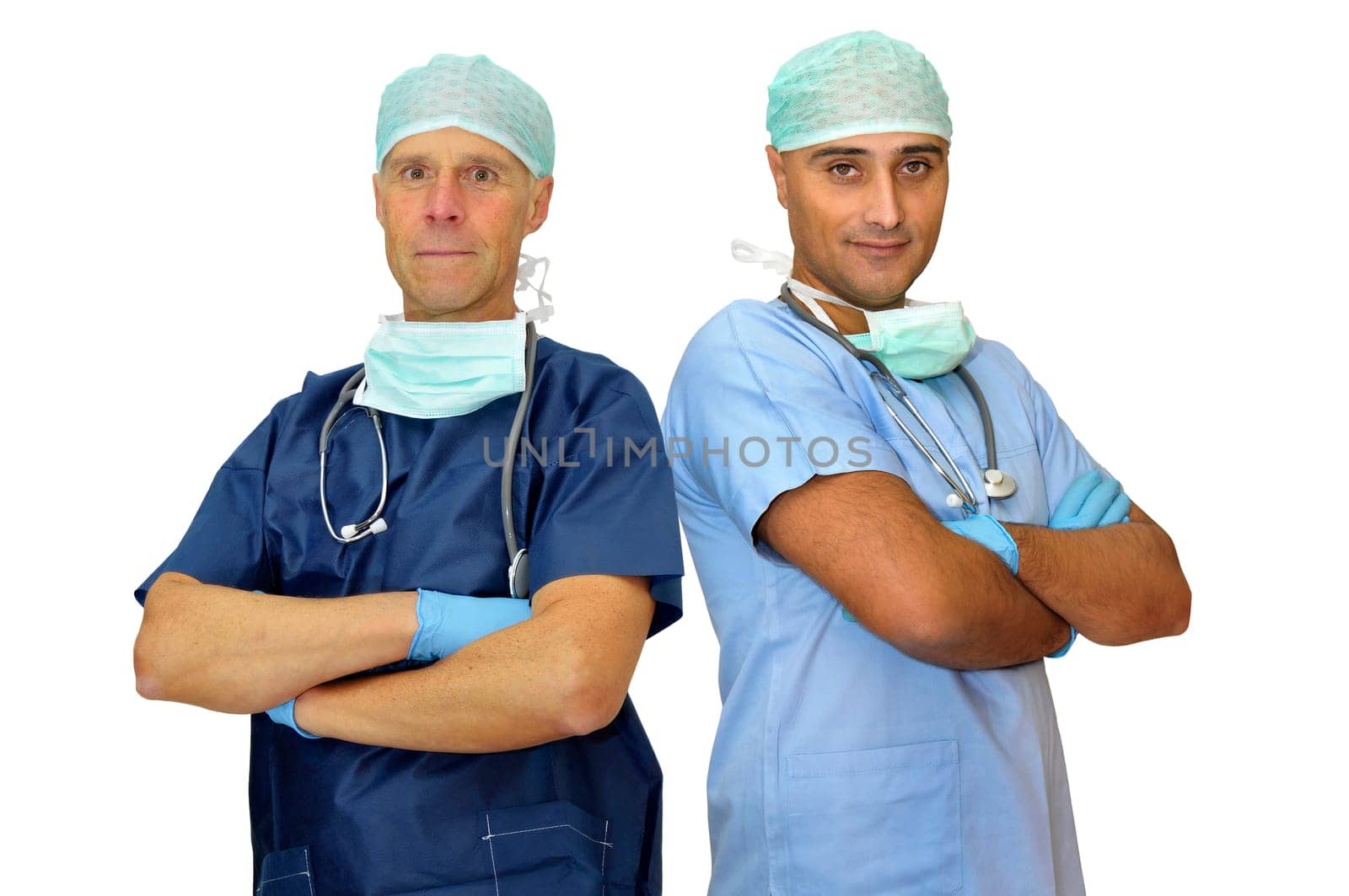 Doctors team in uniform posing isolated in white