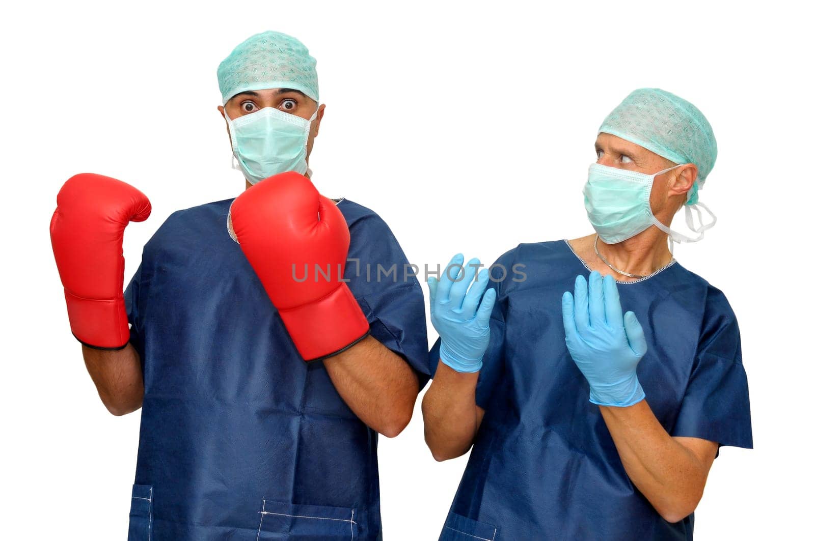 Surprised doctors team with boxing gloves, isolated in white