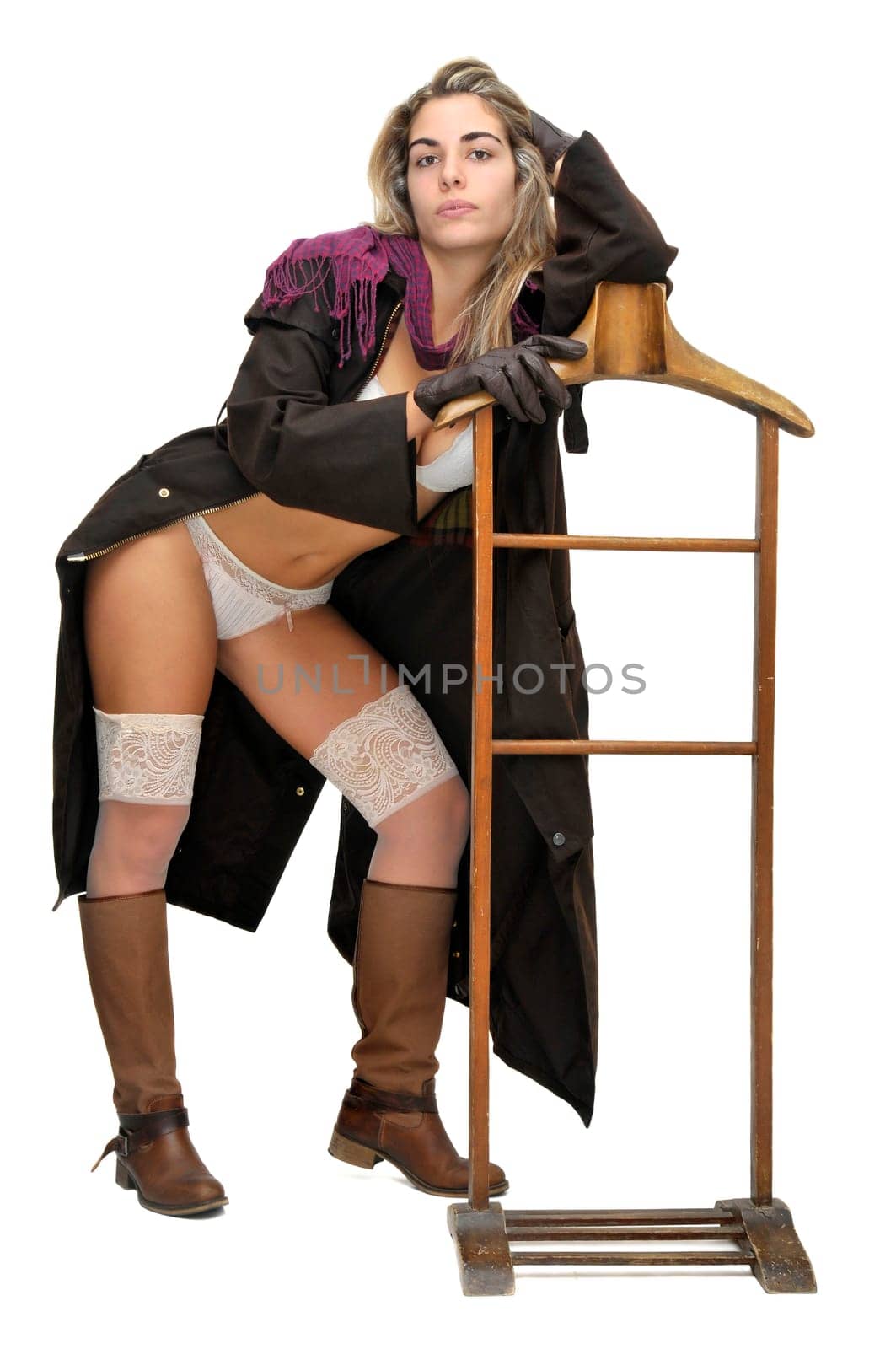 Sexy girl in cowboy outfit isolated in white