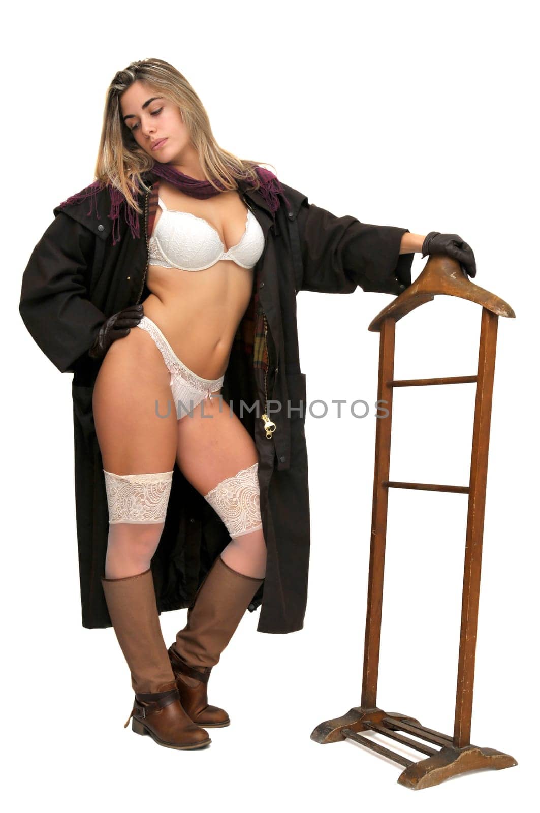 Sexy girl in cowboy outfit isolated in white
