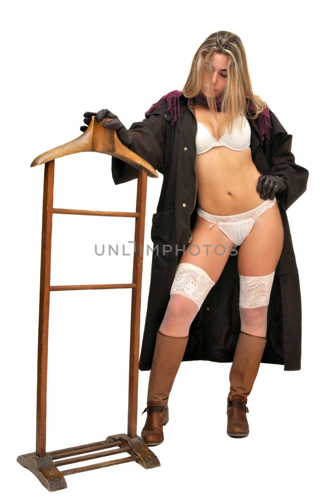 Sexy girl in cowboy outfit isolated in white