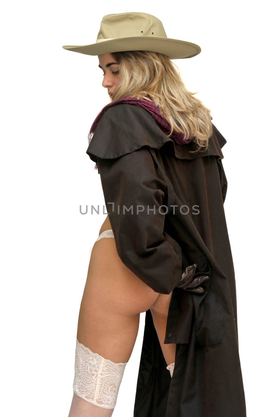 Sexy girl in cowboy outfit isolated in white