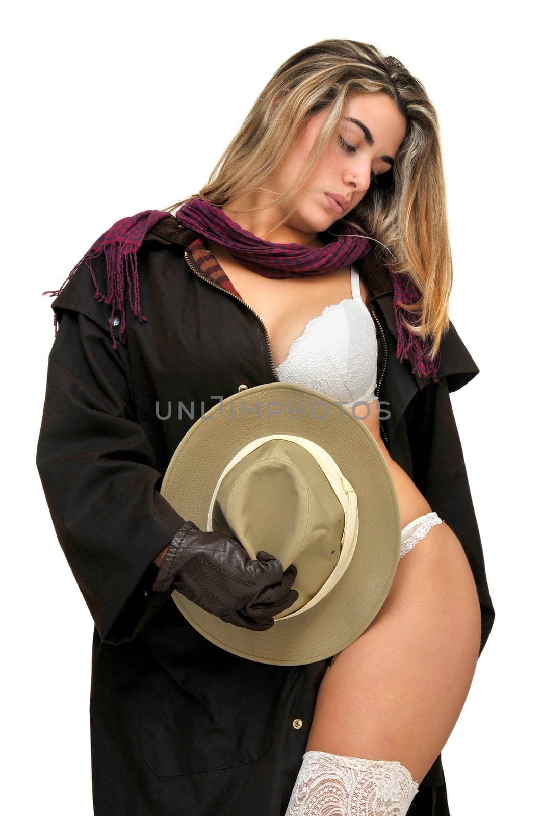 Sexy girl in cowboy outfit isolated in white