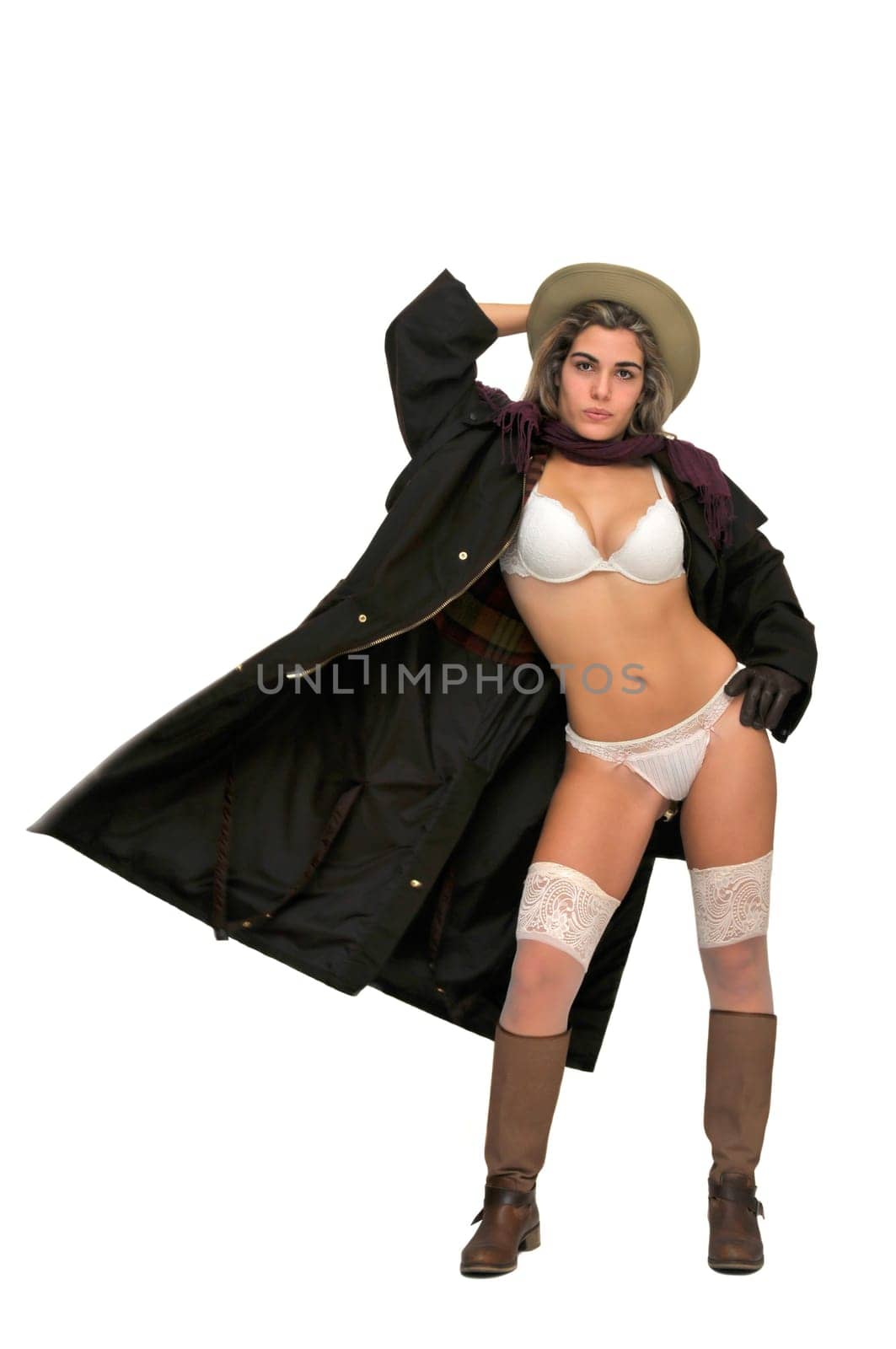 Sexy girl in cowboy outfit isolated in white