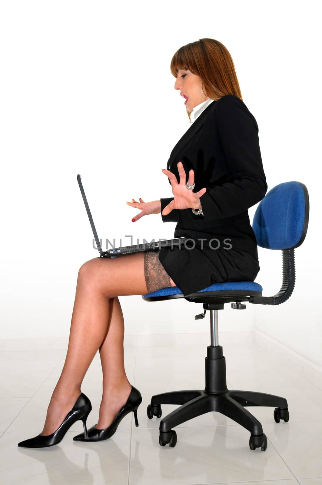 Business woman with laptop isolated in white