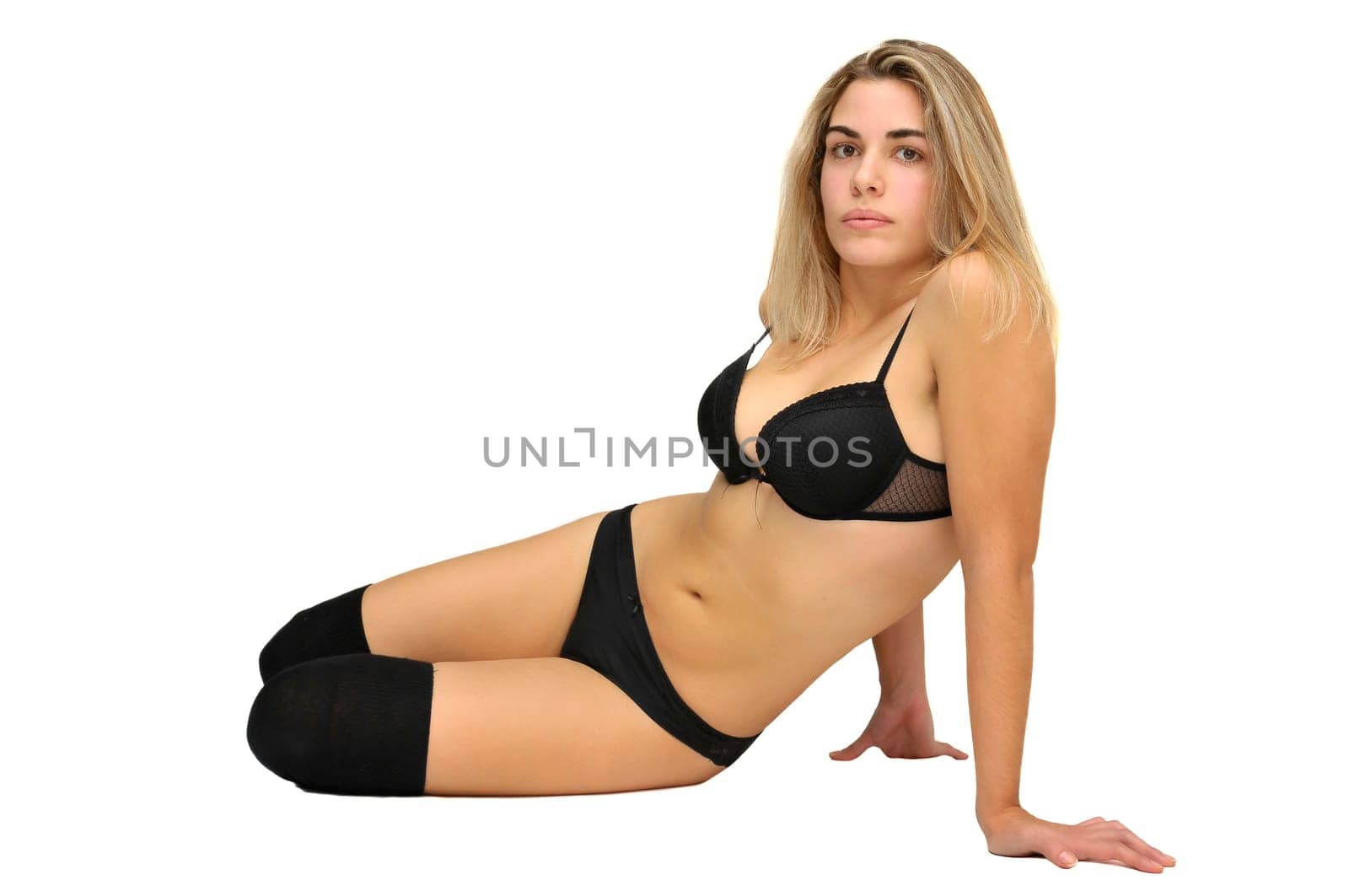 Sexy girl in black lingerie isolated in white