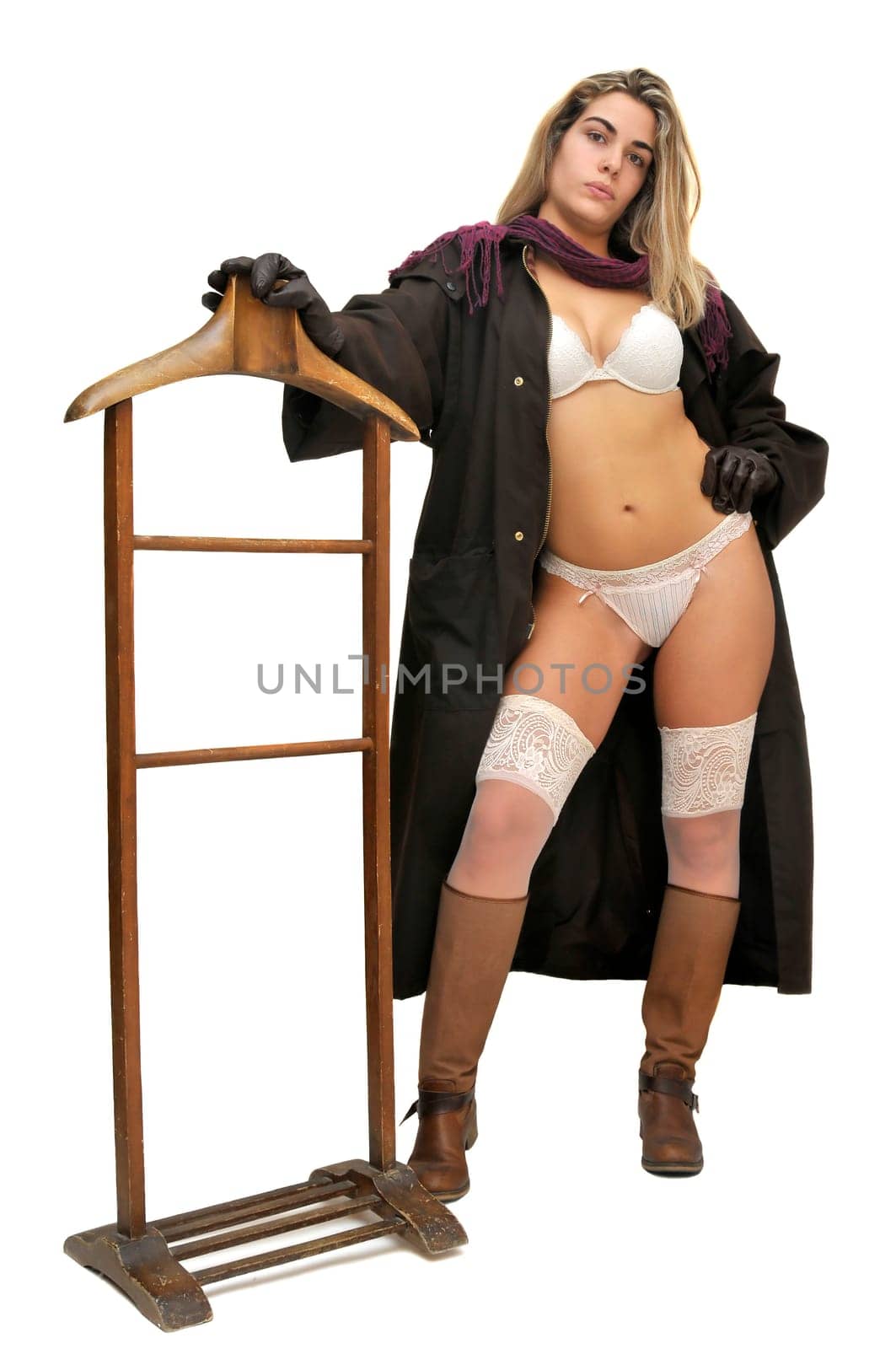 Sexy girl in cowboy outfit isolated in white