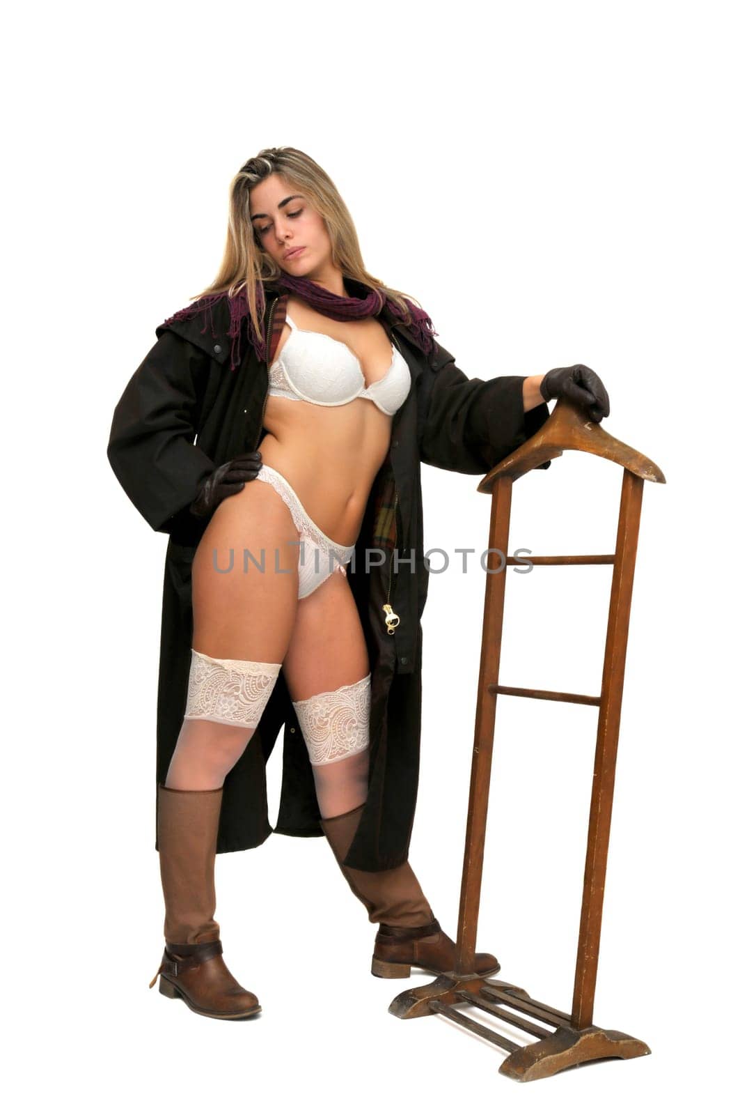 Sexy girl in cowboy outfit isolated in white
