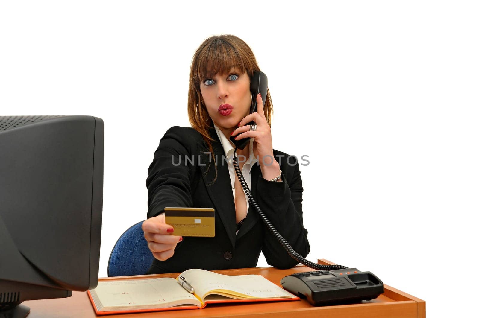 Business woman with credit card isolated in white