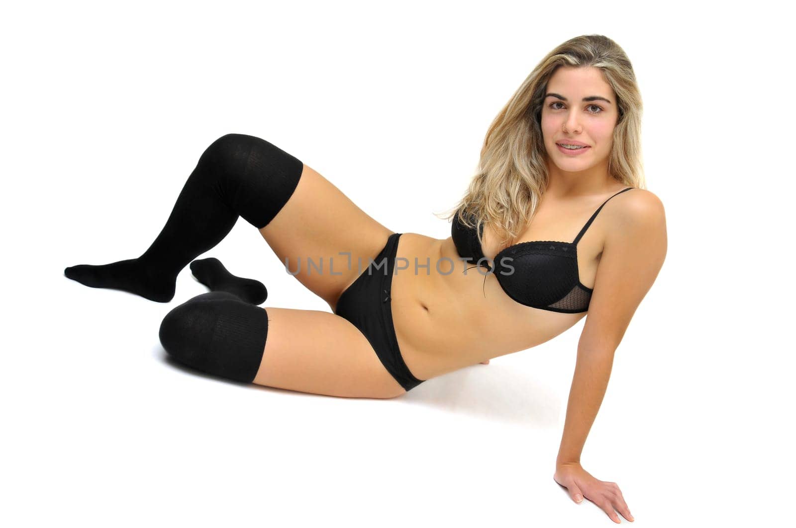 Sexy girl in black lingerie isolated in white