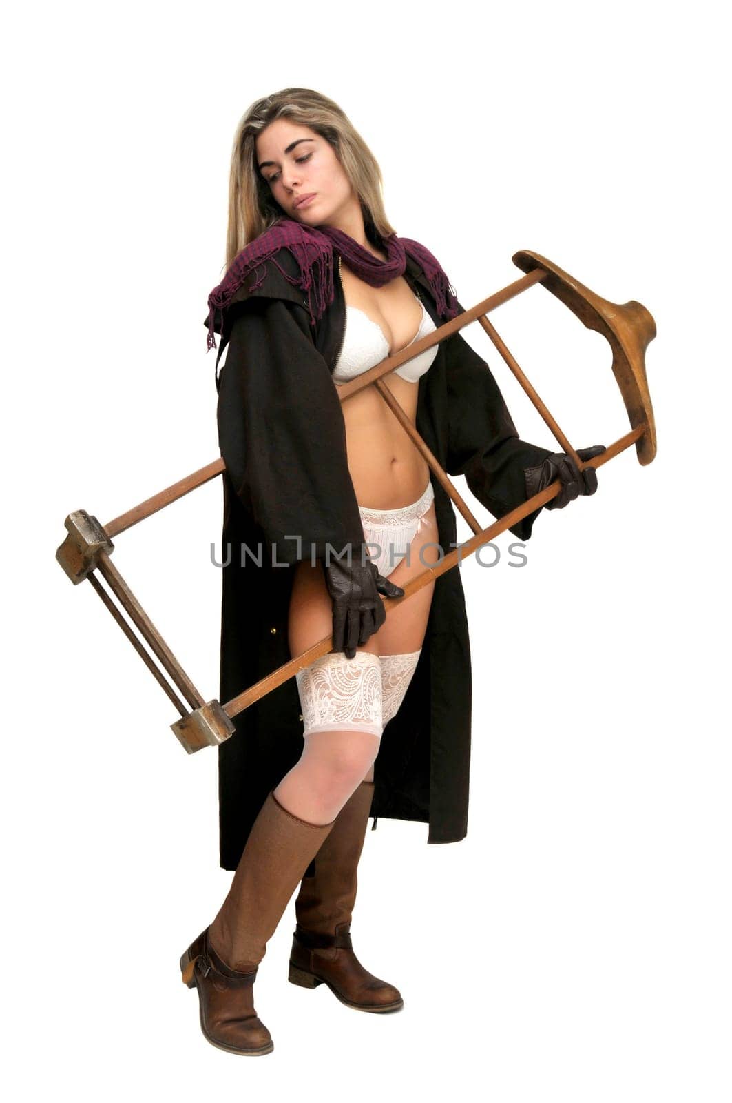 Sexy girl in cowboy outfit isolated in white
