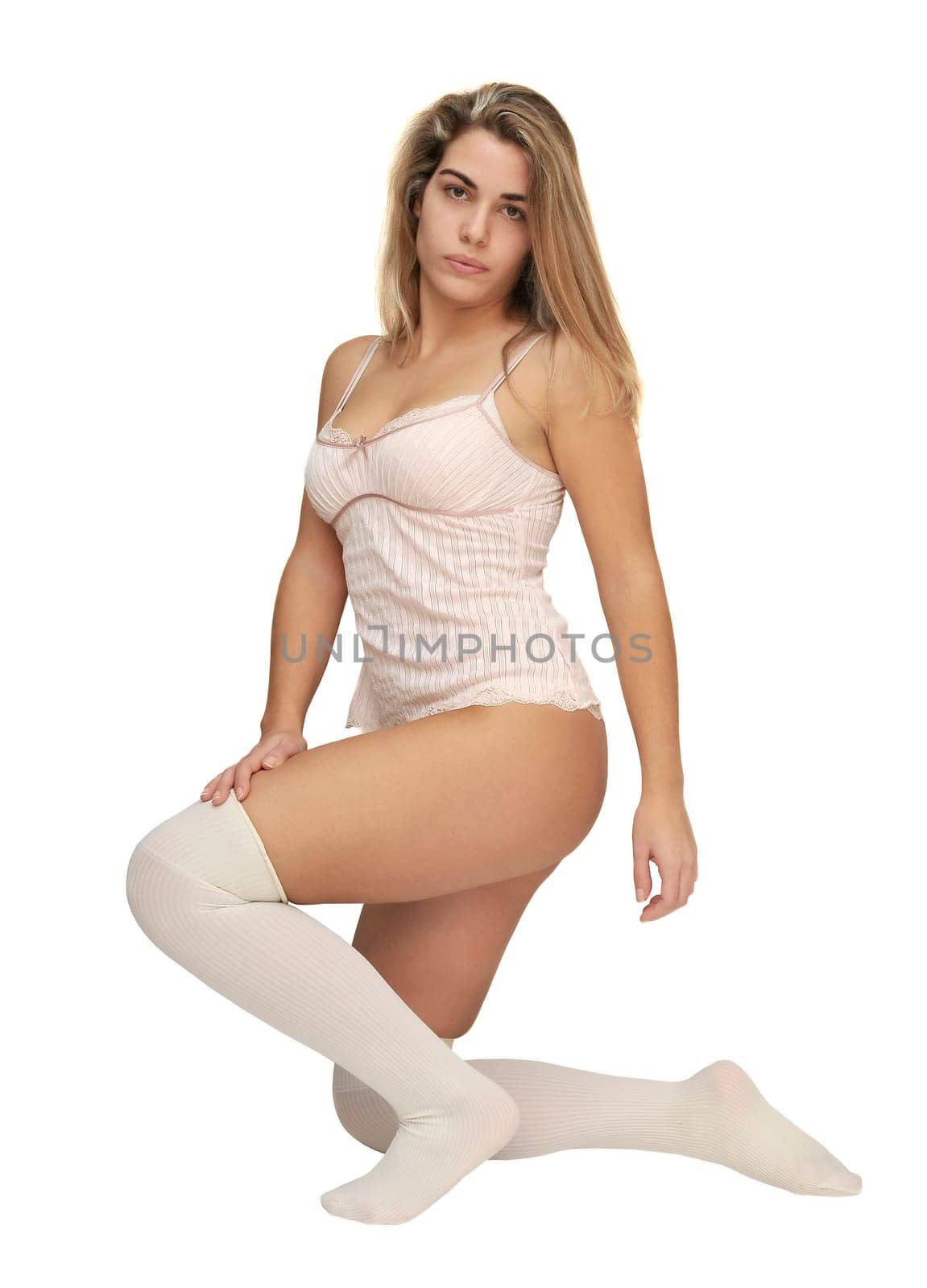 Sexy girl in white and pink lingerie posing isolated in white