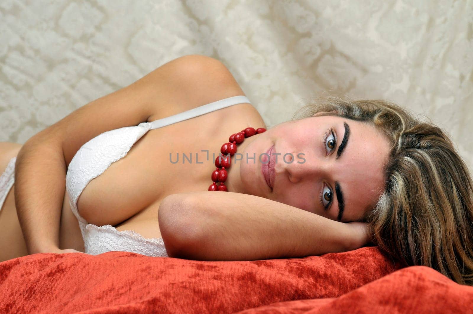 Sexy girl posing in lingerie isolated in white