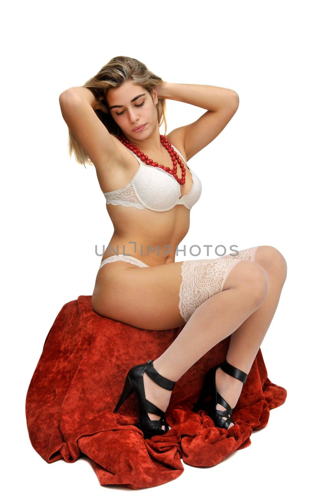 Sexy girl in white and pink lingerie isolated in white