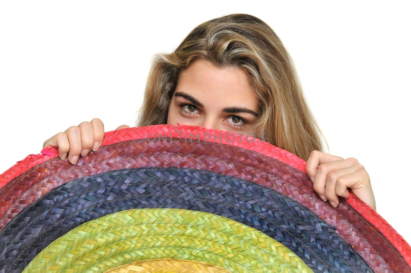 Sexy girl with a big sombrero isolated in white