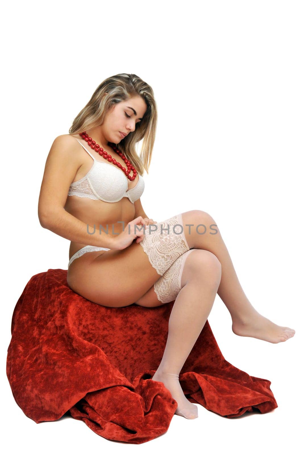 Sexy girl in white and pink lingerie isolated in white