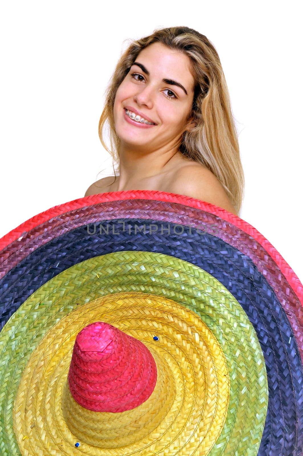 Sexy girl with a big sombrero isolated in white