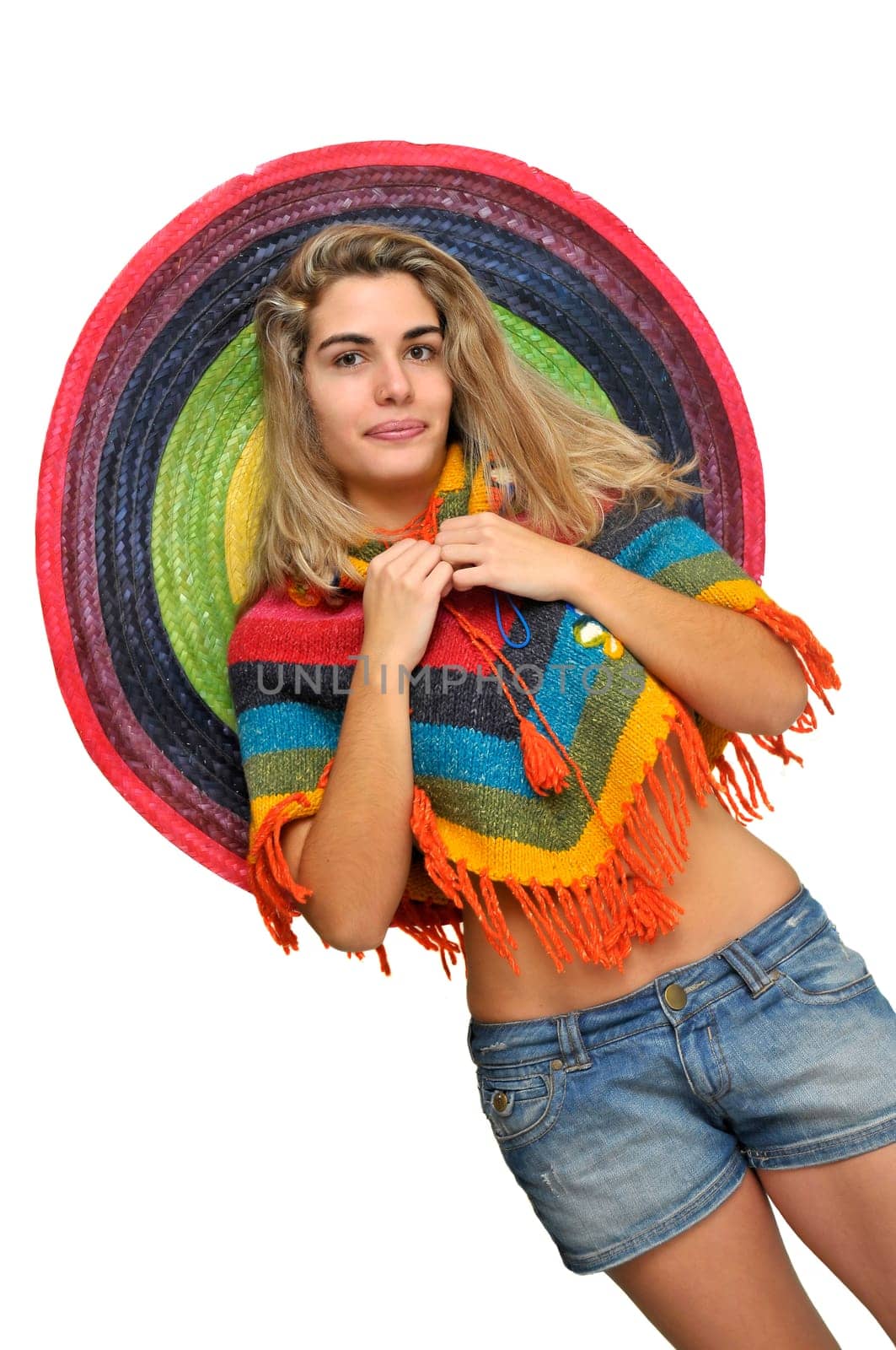 Sexy girl posing with a big sombrero hat isolated in white