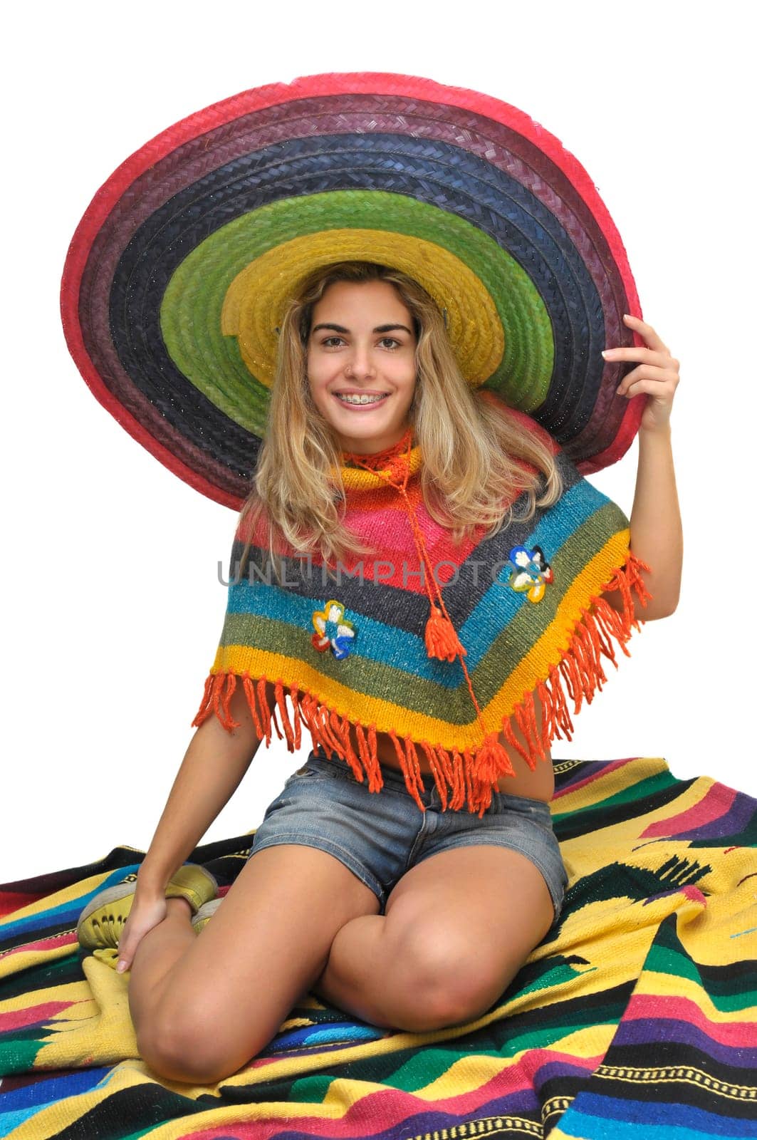 Sexy girl with a big sombrero isolated in white