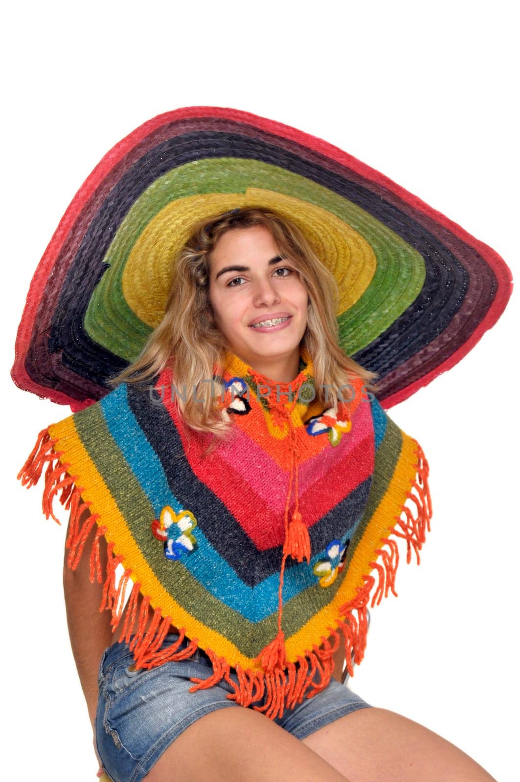 Sexy girl with a big sombrero isolated in white