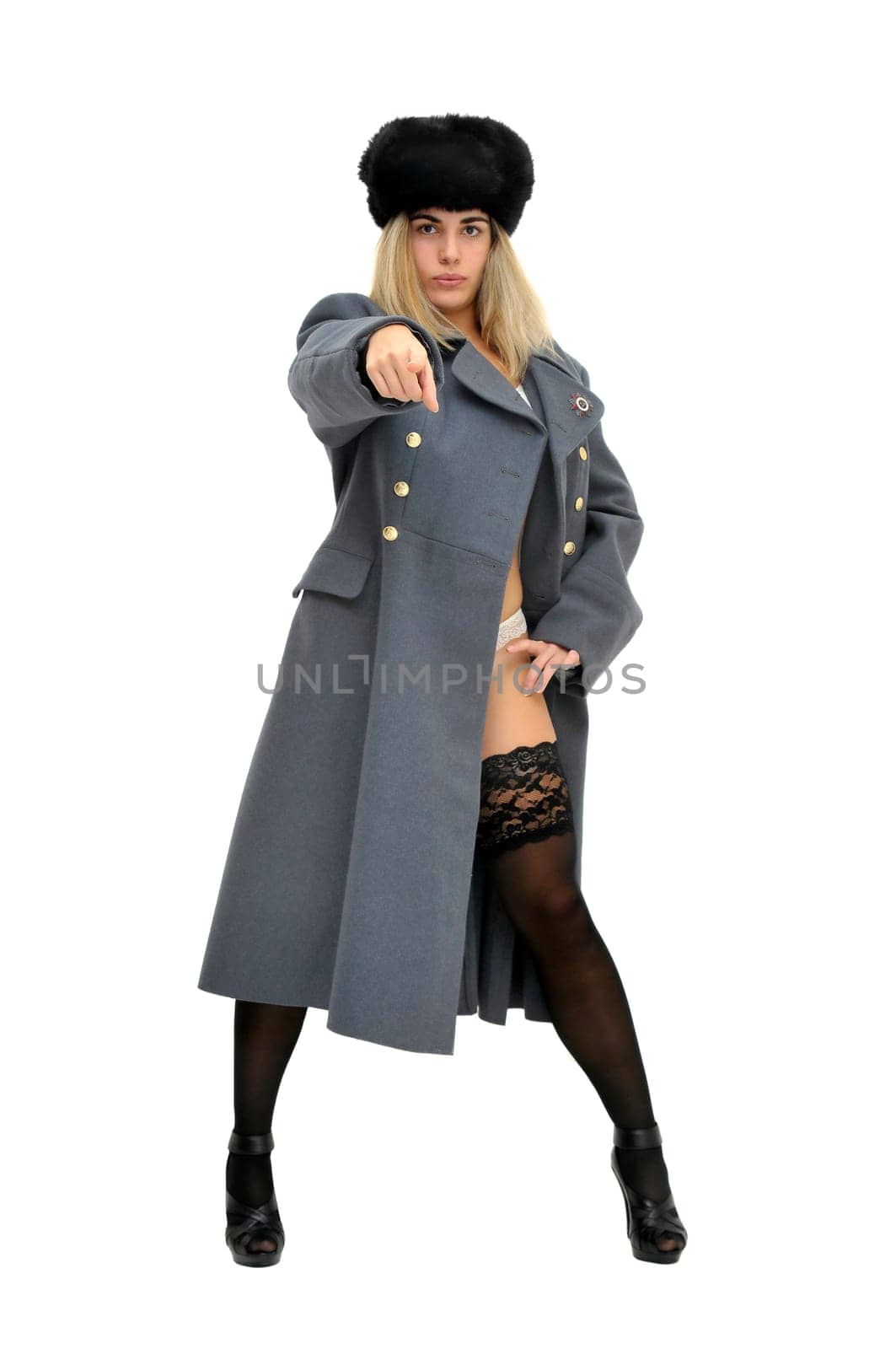 Sexy girl in russian army greatcoat and lingerie isolated in white