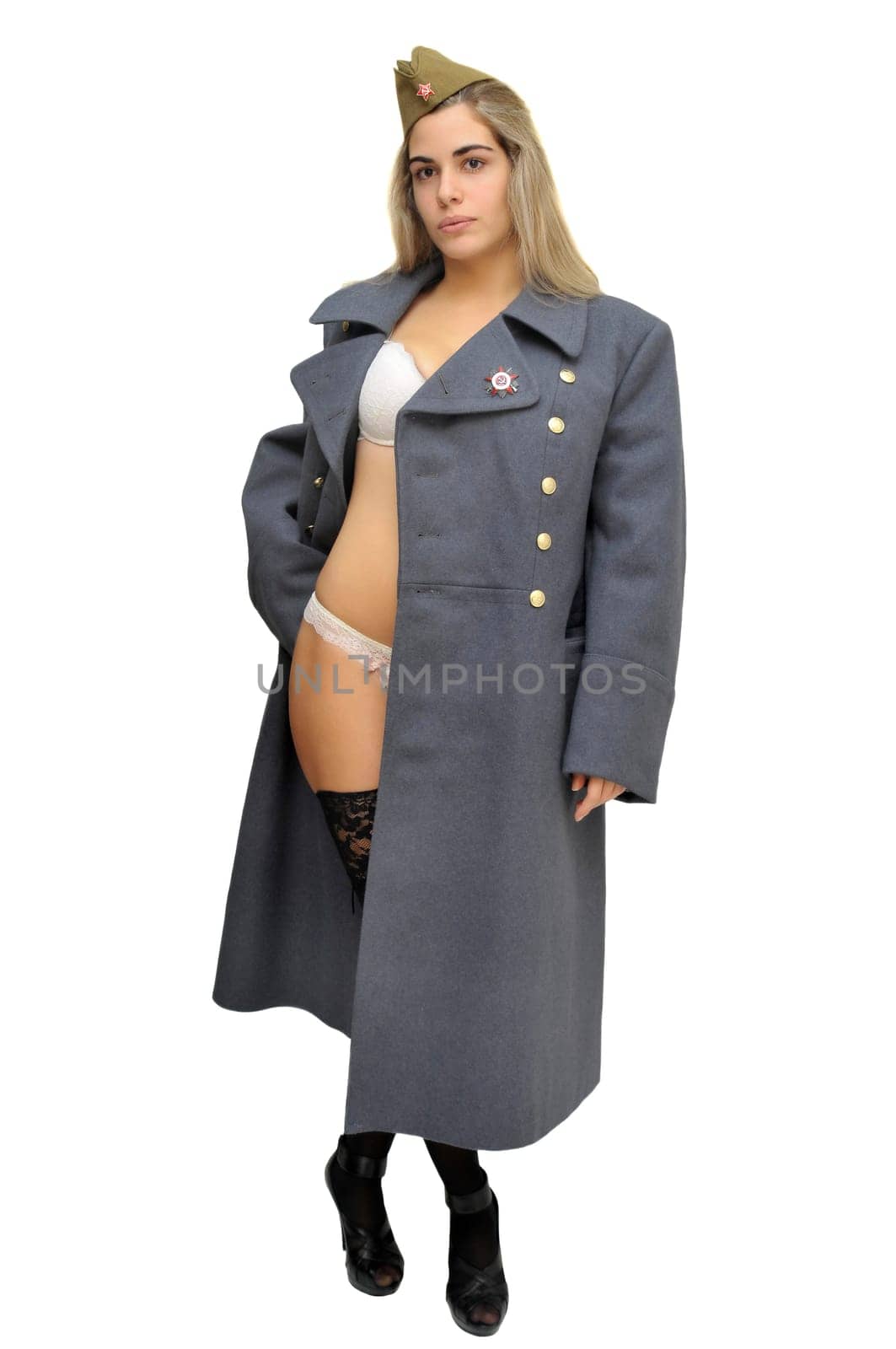 Sexy girl in russian army greatcoat and lingerie isolated in white