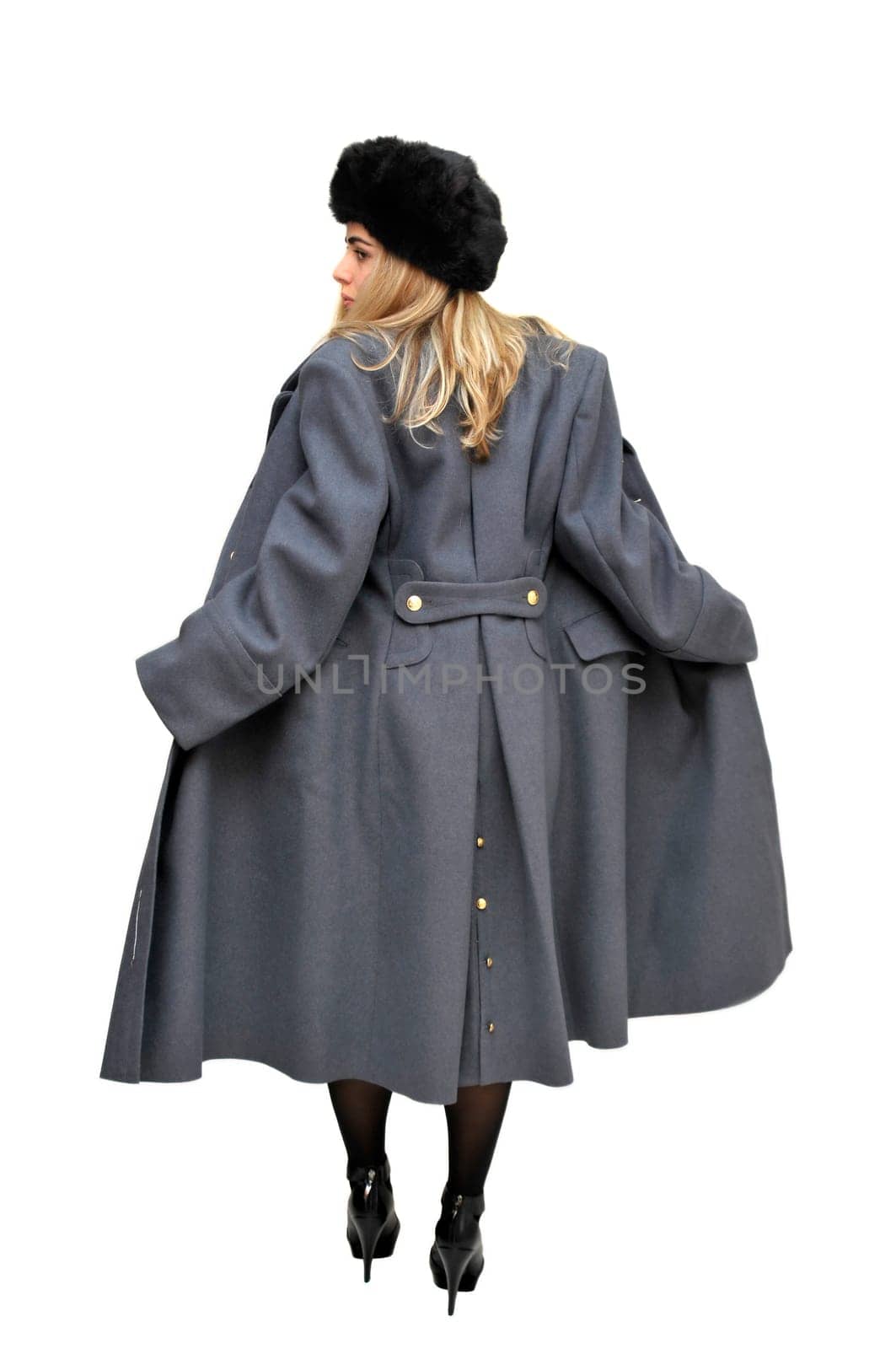 Sexy girl in russian army greatcoat and lingerie isolated in white