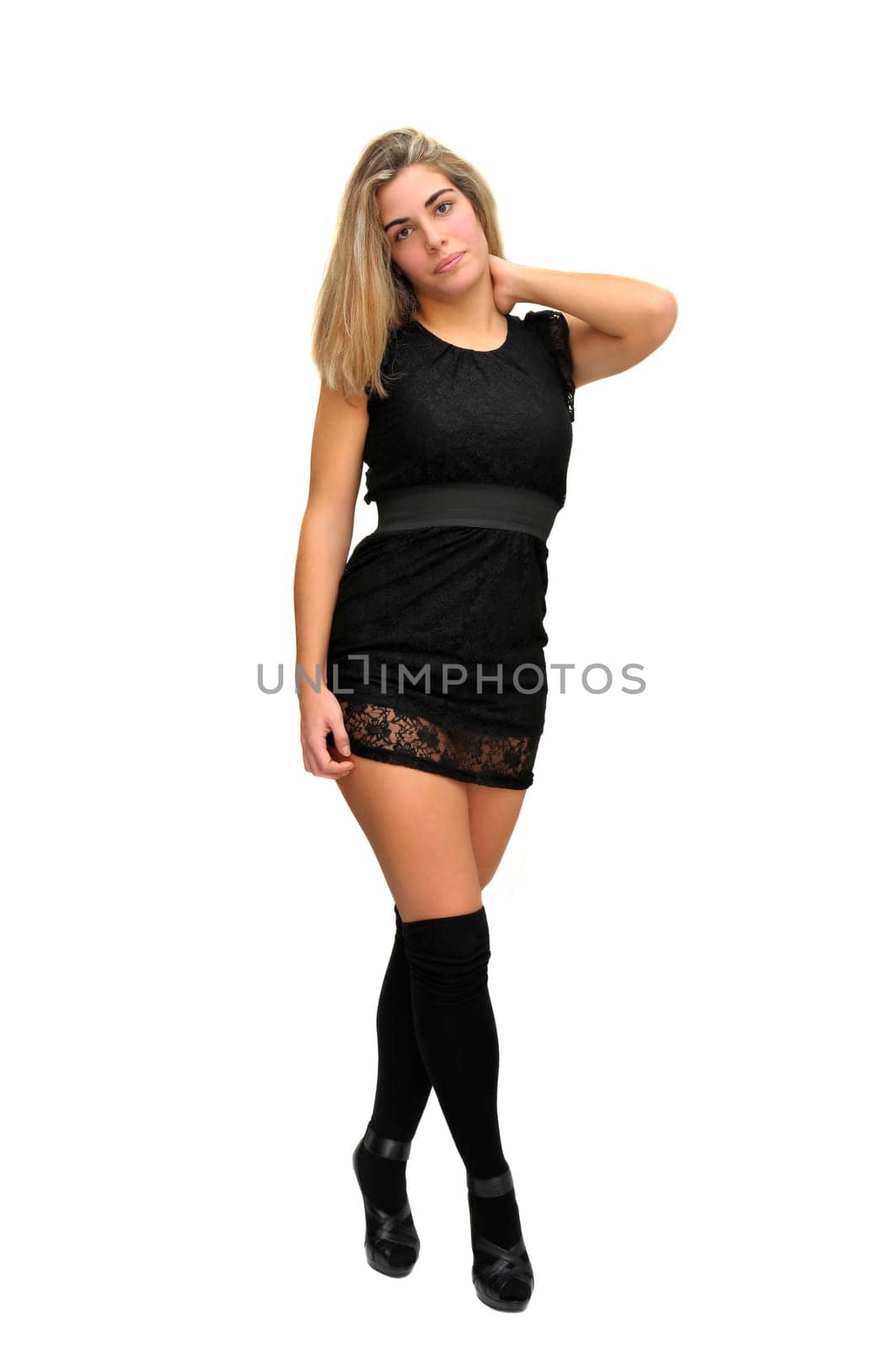 Sexy girl in a black dress isolated in white