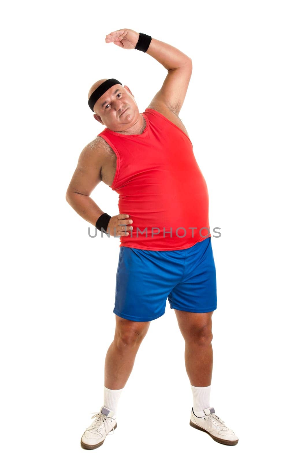 Large fitness man doing exercices isolated in white