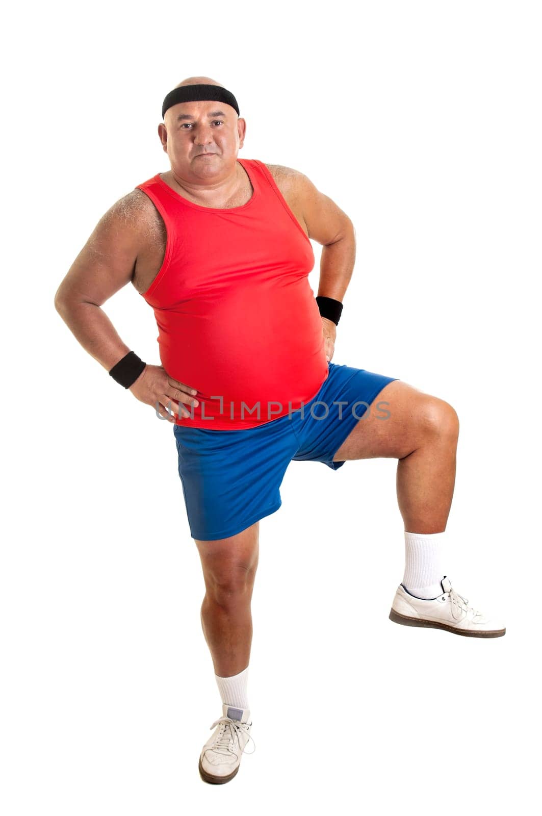 Large fitness man doing exercices isolated in white