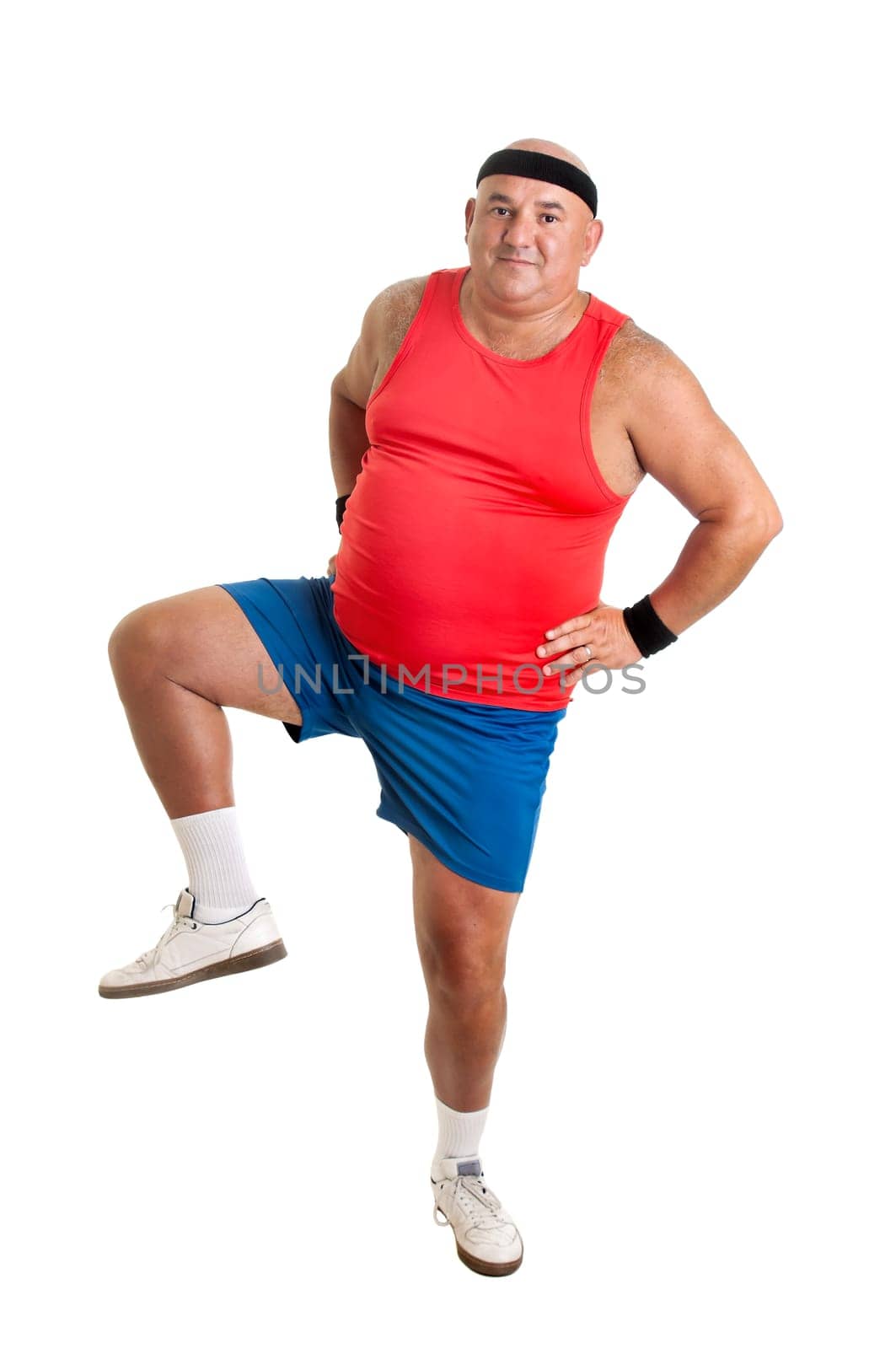 Large fitness man doing exercices isolated in white