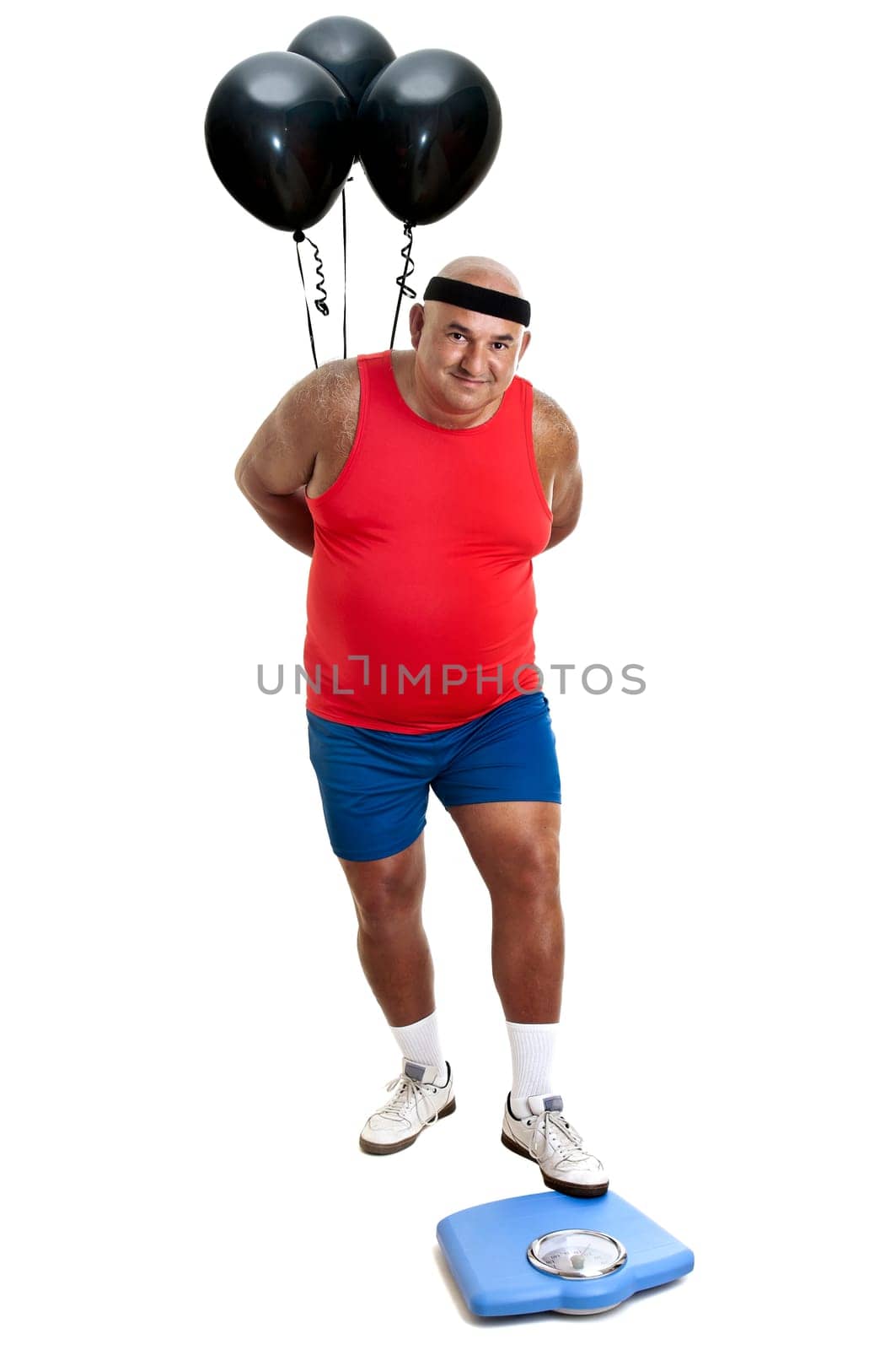 Large fitness man with weight scale and balloons isolated in white