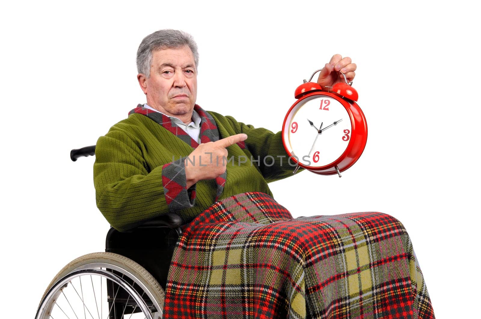 Lonely elderly in a wheelchair with big clock ticking...