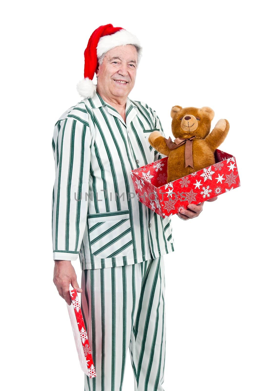 Happy senior with Christmas hat and gift box