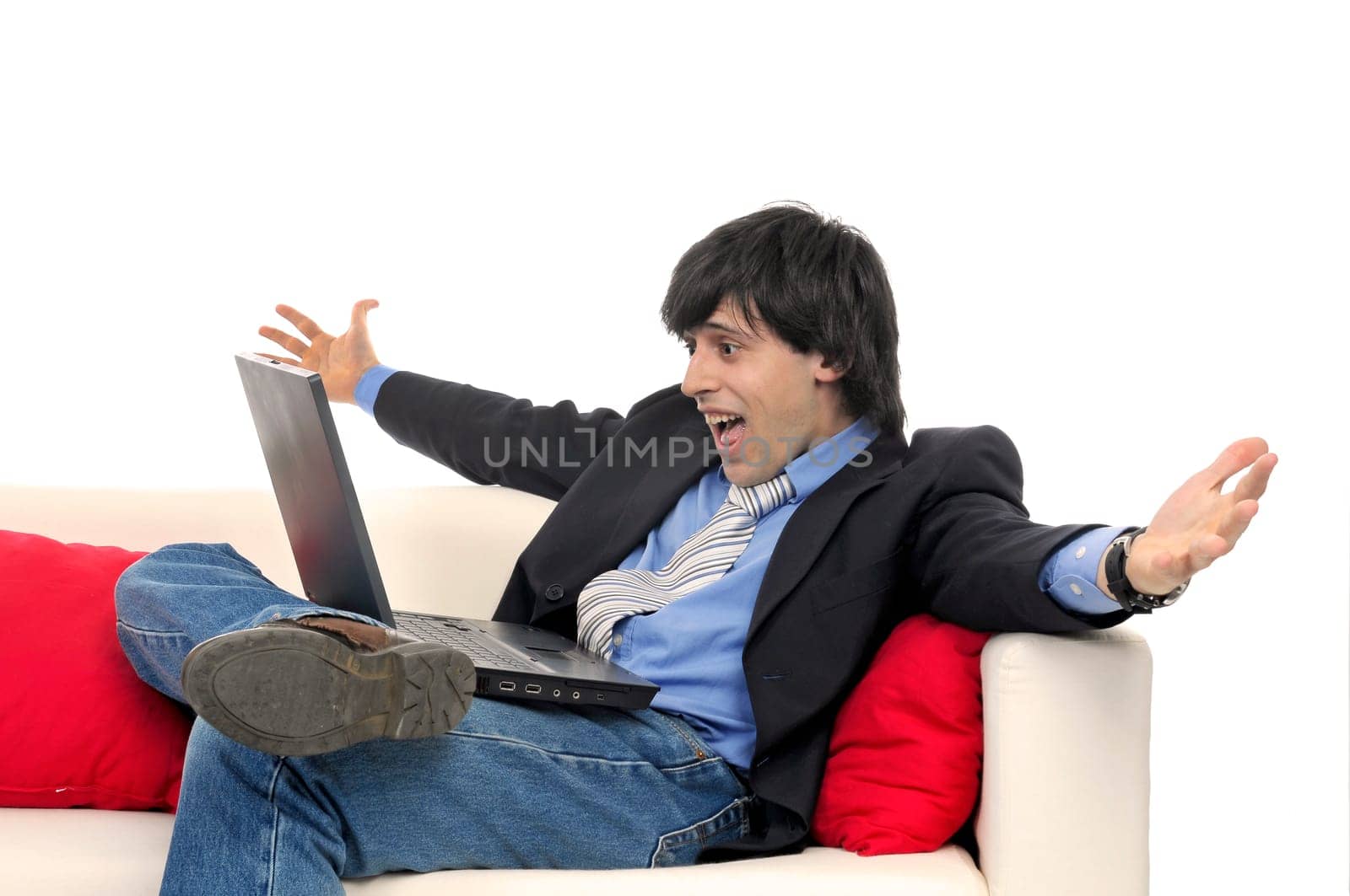 Business man with laptop isolated in white
