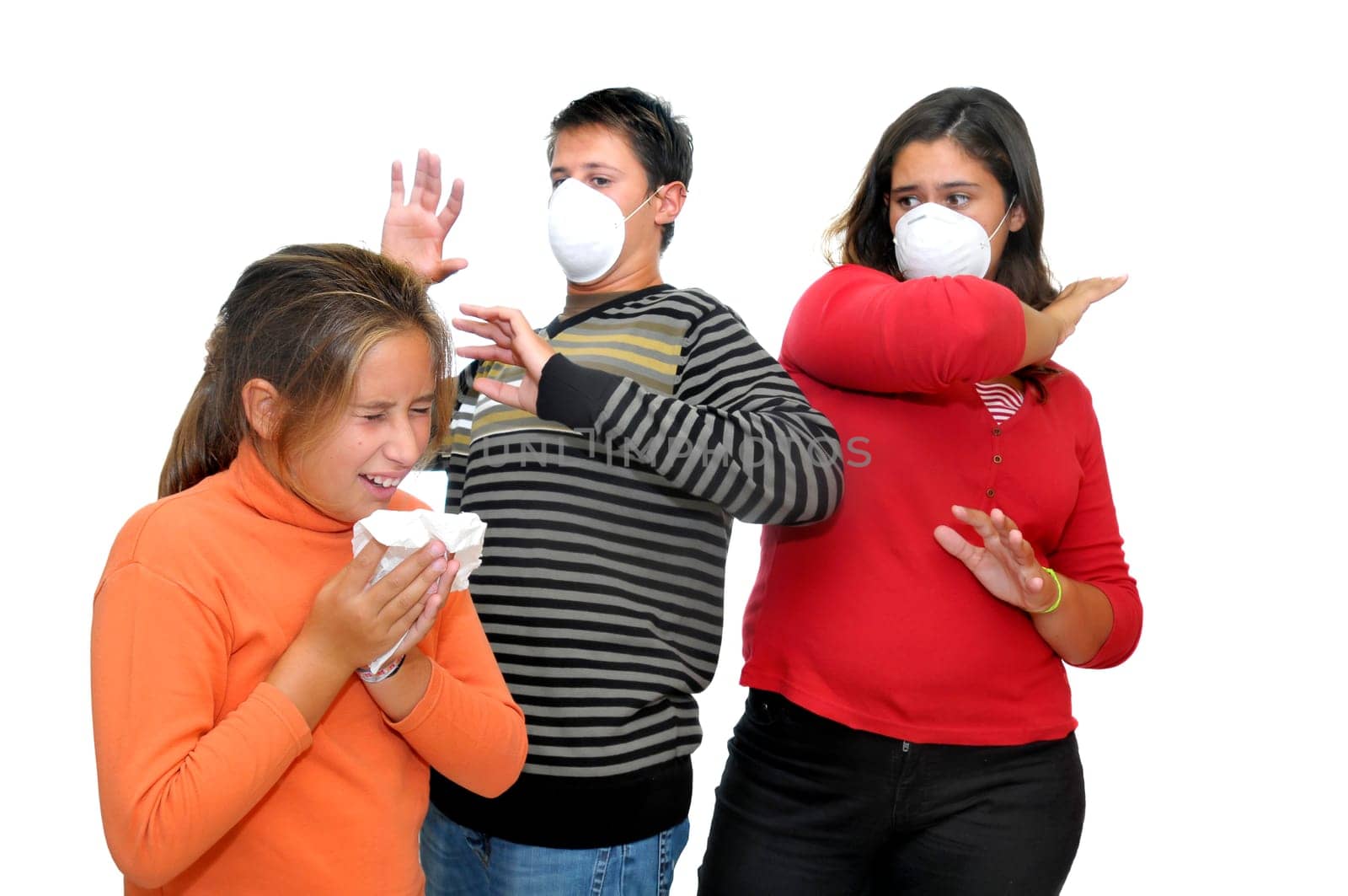 Group of children with masks against the flu and one already sick
