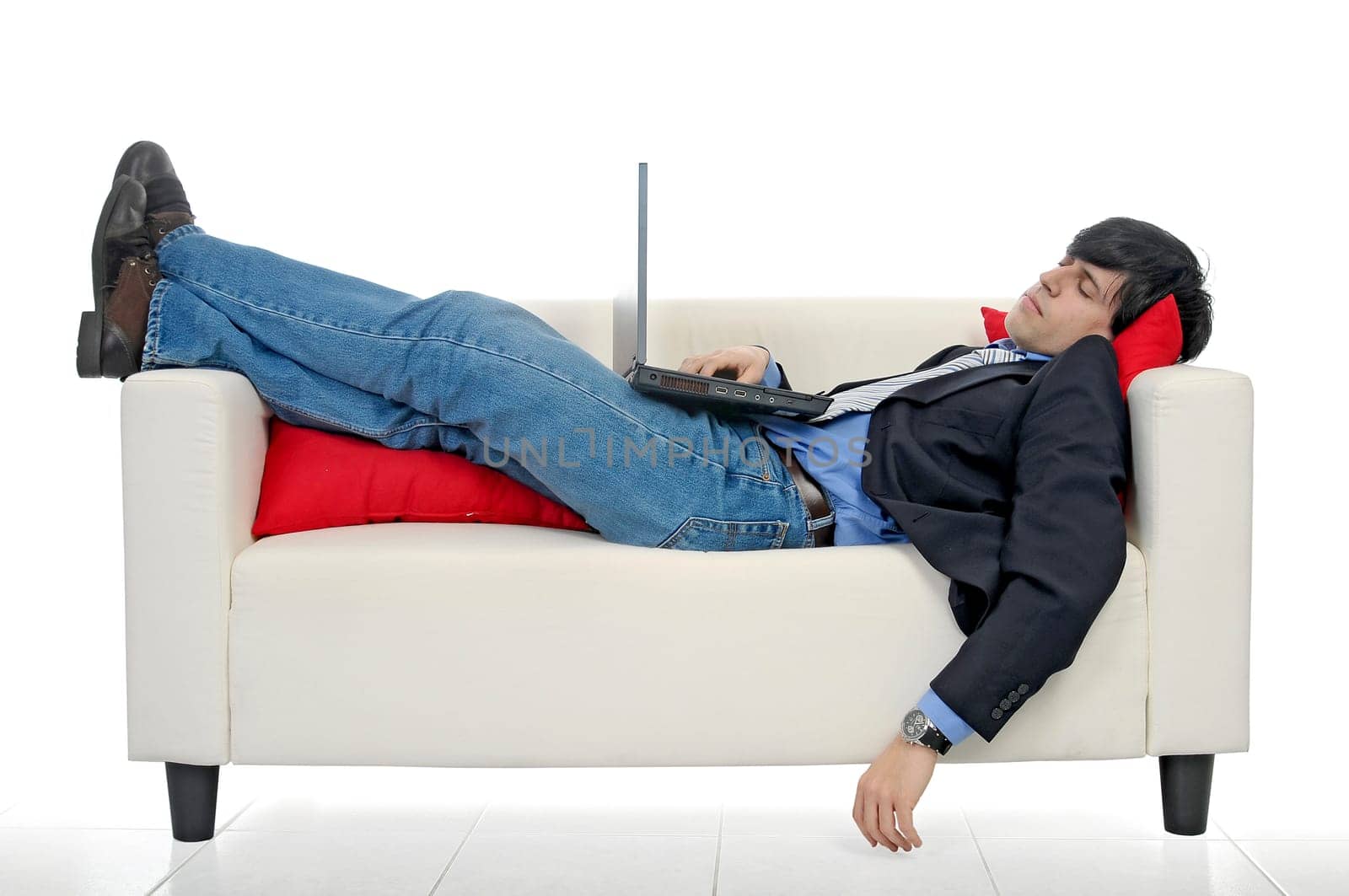 Business man with laptop isolated in white