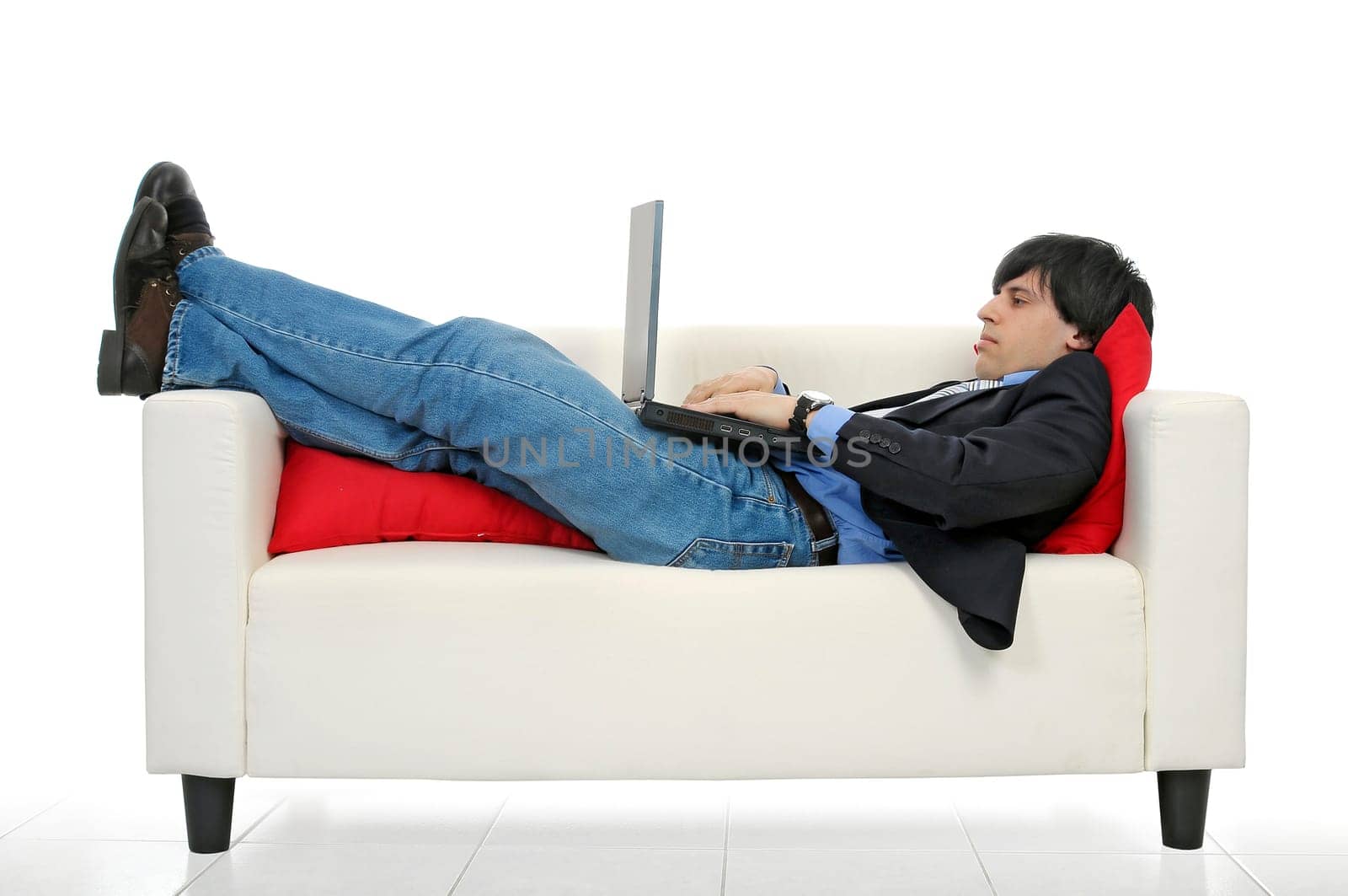 Business man with laptop isolated in white